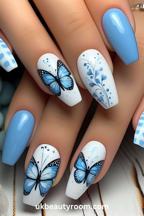 Blue is a popular color in nail art because it has many shades and looks great on all skin tones. This post lists 43 different blue nail designs that showcase the versatility of this color, from subtle pastel blues to vibrant royal blues, providing plenty of inspiration for your next manicure. Nails In Blue, Nail Design Ideas Spring, Nail Art Ideas Butterfly, Cut Nail Designs, Blue Cute Nails, White And Blue Nail Designs, Blue Stuff, Fun Spring Nails Design, Blue Nails With Design