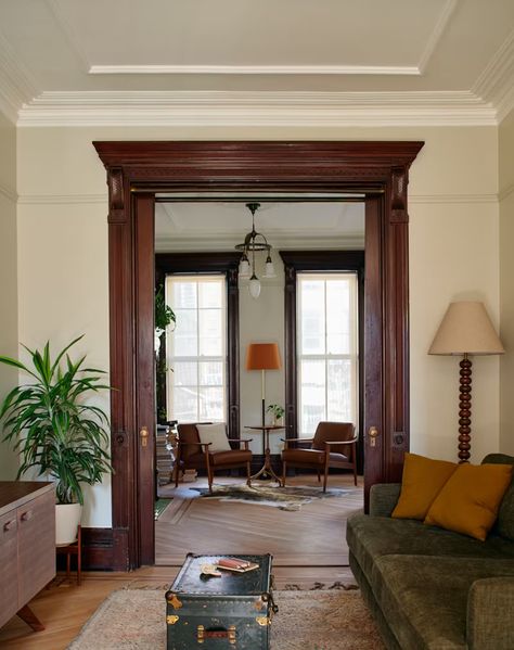 Vintage Brownstone Interior, Brownstone Window Treatments, Historic Home Living Room, New York Brownstone Interior Living Room, Sophisticated House Interiors, Victorian Front Room, Small Apartment Renovations, Vintage Furniture Aesthetic, Brownstone Dining Room