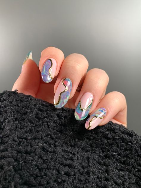 Fun and colourful gel marble nail art with gold chrome 🤩 #gelnails #marblenails #chromenails #chrome #nailart #nails #nailinspiration #nailideas #almondnails #naildesign Chrome With Design Nails, Chrome Nails With Art, Nail Marble Art, Colourful Chrome Nails, Chrome And Marble Nails, Marbal Art Nail, Chrome Marble Nails, Marble Chrome Nails, Colourful Nails Designs