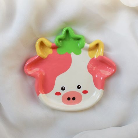 Find us on instagram: @mays.archive Strawberry Cow Ring Clay, Trinket Dish Clay, Clay Jewelry Dish Cow, Strawberry Cow Clay, Cow Trinket Dish, Strawberry Cow Pottery, Diy Resin Phone Case, Clay Plates, Friend Crafts