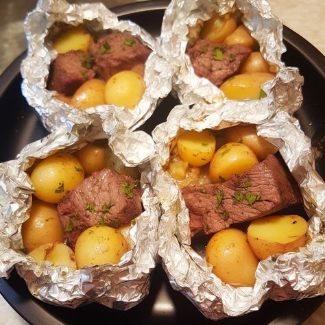 Garlic Butter Steak Bites Foil Packs, Fire Meals, Baby Yellow Potatoes, Potato Foil Packets, Foil Packet Potatoes, Chicken Foil Packets, White Bean Soup Recipes, Garlic Steak, Steak Potatoes