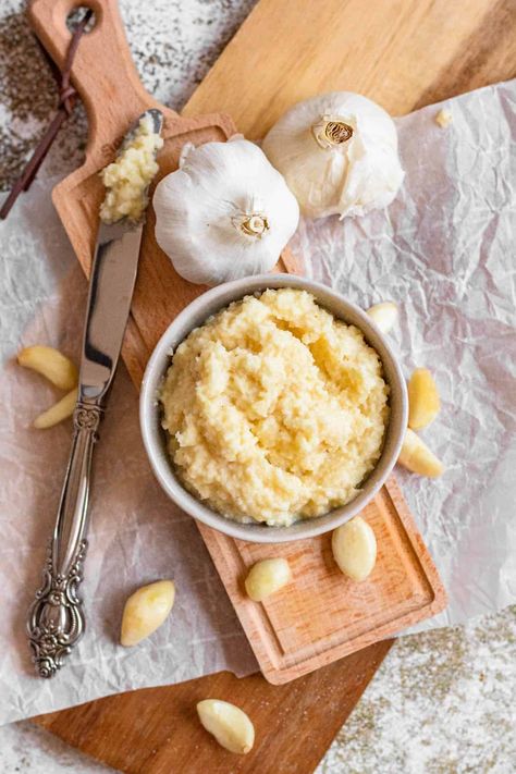 There’s nothing worse than gearing up to make dinner when you realize you need garlic - you bought some but it's still neatly wrapped in its bulb. I hear your sighs and I have your solution - homemade garlic paste. What is garlic paste? It’s simply blended garlic and oil made in a blender or food processor. I love making garlic paste at the beginning of a busy week to keep in the fridge so that when I need it, it’s ready to use in my favorite recipes. Garlic And Oil, Lebanese Garlic Sauce, Sauces And Dressings, Confit Recipes, Pickled Garlic, My Favorite Recipes, Potato Vegetable, Vegetable Pasta, Garlic Recipes