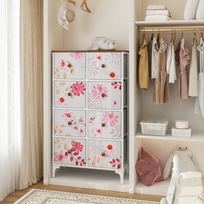 This fabric dresser for the bedroom is ideal for wherever you want to keep clutter under control, such as the bedroom, nursery, closet, entryway, dorm, or living room, and matches perfectly with other storage drawers. | Wildon Home® Kolby 8 Drawer Tall Dresser 46.5" Pink/Green/Brown 46.5 x 26.6 x 11.7 in, Manufactured Wood;Stainless Steel | C100017978_322620778 | Wayfair Canada