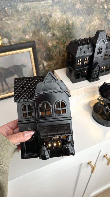 Aurelie Erikson on Instagram: "Target Dollar Spot mini Haunted house makeover 🏰🕸️ Isn’t it wild what a little spray paint can do? I couldn’t love the way these turned out more. 👻 Have you spotted these at your Target yet? save & share with a Target & Halloween lovin friend 🫶🏼 . . . . . . #halloweendecor #halloweenhome #halloweenhomedecor #targethalloween #targetdollarspot #bullseyesplayground #diyhalloween #halloweendiy #diyhauntedhouse #spookyseason #easydiy" Diy Cauldron, Mini Haunted House, Iridescent Ornaments, Spray Paint Can, Haunted House Diy, Target Halloween, Spray Paint Cans, House Makeover, Halloween Baking