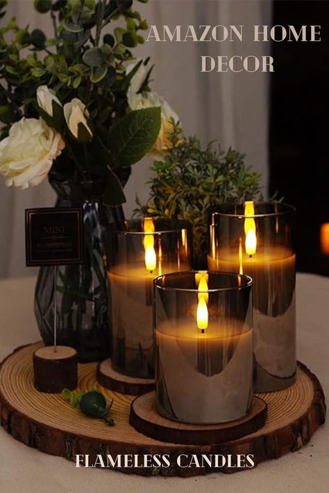 Perfect for cozy home inspo! Battery Operated Candles, LED Pillar Candles with Remote Control and Timer, Electric Fake Candles, Wax, Grey Glass, D3 H4 5" 6", Set of 3 As an amazon associate I may benefit from qualifying purchases. #cozy #home #inspo #decor #candles #flameless #trendy #winter #christmas #holidays #gifts Calming Candles, Fake Candles, Battery Candles, Globe String Lights, Unique Floor Lamps, Aesthetic Room Ideas, Led Pillar Candle, Electric Candles, Flickering Lights