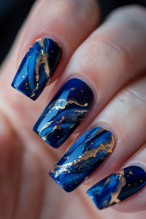 Royal Blue And Gold Marbling: Nail Designs For A Royal Blue Dress Blue Nail Manicure, Nail Art Designs Royal Blue, Blue And Gold Nail Designs Short, Cute Blue Nails Ideas, Blue Gold Marble Nails, Royal Blue And Gold Nails Short, Blue Gold Nail Art, Blue And Gold Wedding Nails, Blue And Bronze Nails