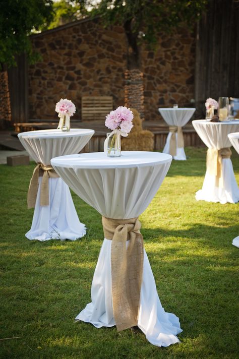 Bistro tables in front of the Harn Bistro Table Wedding Decor, Wedding Cocktail Table Decor, Log Cabin Wedding, Wedding Cocktail Tables, Cocktail Table Decor, Homestead Wedding, Cocktail Party Decor, Wedding Reception Planning, Wedding Renewal