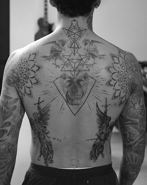 Symmetrical tattoo on @nyjah’s back Done by @koray.ozsoy 🇺🇸 For booking contact tattoo artists directly For inspiration only. Do not copy… Back Tattoos For Men, Symmetrical Tattoos, Connecting Tattoos, Back Tattoo Designs, White Henna Tattoo, Symmetrical Tattoo, Tattoo Quotes For Men, Small Back Tattoos, Body Tattoo Design