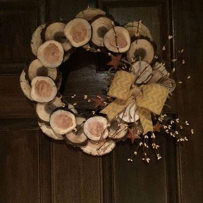 She sliced up the wood from cut-down trees, and look what she made for her front door! I love making home decor that comes from nature! Every morning, I take my fur babies for a walk in the neighborhood park, it has trails that wind thru the woods. Fall Wood Slice Wreath, Winter Wood Crafts, Neighborhood Park, Winter Wreath Diy, Wood Wreath, Wooden Wreaths, Winter Wood, Wreath Diy, Wood Crafts Diy