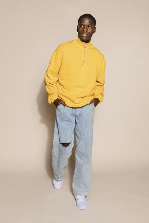 Handsome young man in yellow sweater and jeans | premium image by rawpixel.com / McKinsey Blue And Yellow Outfit Ideas Men, Yellow Streetwear Outfit Men, Yellow And Grey Outfit Men, Yellow Fashion Men, Mens Yellow Outfit, Yellow Sweatshirt Outfit Men, Yellow Clothes Men, Yellow Fits Men, Yellow T Shirt Outfit Men