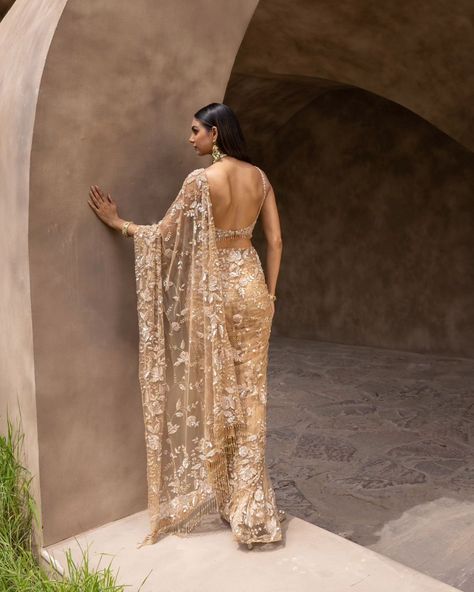 Find us a better destination wedding fit 🥂✨️, we'll wait.... MALAIKA - Champagne hand embroidered sequins and buggle beads saree adorned with tassle detailing in blouse and pallu. Cosmos: A Cocktail Affair Discover the collection: Online at Roujeofficial.com via link in bio Calcutta | Hyderabad Jewelry: @gkchudiwalas [ Roujeofficial, rouje, tassels, crystals, sequins, hand embroidery, cocktail saree, party outfits, after party outfit, bridesmaid outfit, Sangeet, wedding day, reception... Reception Saree, Mehndi Decor, Simple Sarees, Stylish Sarees, Satin Color, Bridesmaid Outfit, Embroidered Blouse, Saree Collection, Amazing Destinations