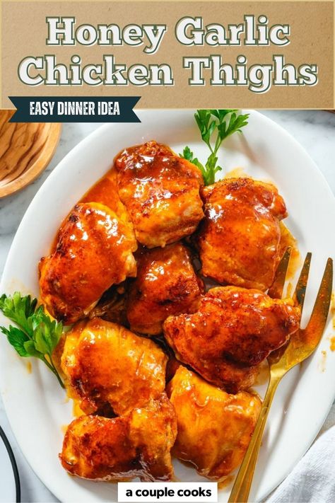 These honey garlic chicken thighs are sweet, sticky, and ready in 30 minutes—perfect for weeknight dinners. Find the recipe on our site! What To Do With Chicken Thighs, Dinner Recipes For One Person, Healthy Chicken Thigh Recipes, Garlic Chicken Thighs, Honey Garlic Chicken Thighs, Winter Salad Recipes, A Couple Cooks, Vegan Recipes Plant Based, Couple Cooking