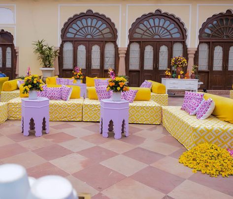 Sharvi and Ishaan’s Haldi decor, a perfect blend of tradition and modern flair at @thealsisarnahargarh 💛💜 Photos- @thewhitebox.in #alsisarmahal #alsisarnahargarh #nahargarhwedding #alsisarmahal #decorbykomal #inspiredesign #weddingdecoration #shaadisaga #decorbykomal #decorationinspo #indianwedding #luxurywedding #grandwedding #goaweddingplanner #goaweddingdecor #weddingdecorator #weddingsofinstagram # #floraldesign #flowerdecoration #weddingdecorideas @fabwedding @weddingz.in @shaadidukaa... Yellow And Lavender, Goa Wedding, Haldi Decor, Yellow And Purple, Seating Arrangements, Sofa Covers, Luxury Wedding, Hanging Decor, Flower Decorations