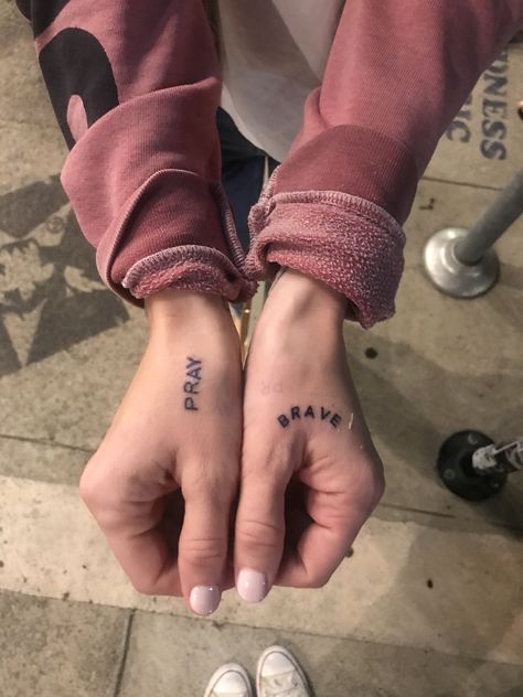 Some fresh tiny tattoos I got while in LA from a Vegan tattoo artist! Timely words on my hands saying brave and pray Word On Hand Tattoo, Finger Nail Tattoo, Pray Tattoo Hands, Hand Word Tattoos, Christian Hand Tattoo, Hand Tattoos Words, Introvert Tattoo, Word Tattoos On Hand, Finger Tattoos Designs