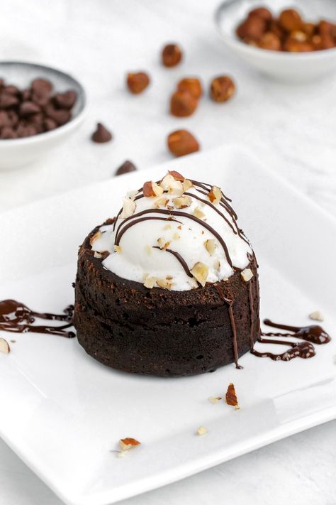 An instant pot lava cake with ice cream on top and drizzles of Nutella Lava Cake Plating, Lava Cake With Ice Cream, Cake Plating, Cake With Ice Cream, Lava Cake Recipe, Chocolate Lava Cake Recipe, Chocolate Desserts Cake, Molten Cake, Molten Chocolate Lava Cake