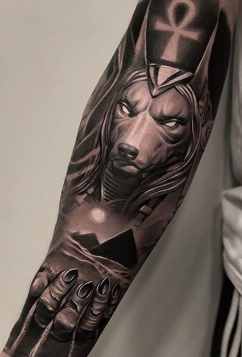 Anubis Tattoos: Meanings, Artists, Tattoo Designs & Ideas African Sleeve Tattoo, Egypt Tattoo Design, Egyptian Cat Tattoos, Symbols Tattoos, Pyramid Tattoo, Egyptian Eye Tattoos, Horus Tattoo, Africa Tattoos, Egyptian Tattoo Sleeve