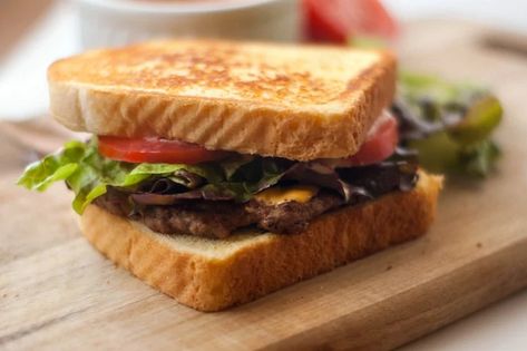 Texas Toast Griddle Burgers | Heather Likes Food Griddle Burgers, Texas Toast Bread, Field Meals, Tasty Sandwiches, What A Burger, Breakfast Burger, Grilled Cheese Sandwiches, Make French Toast, Griddle Cooking