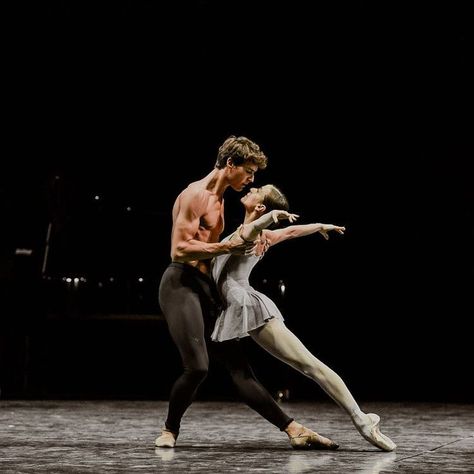 The male dancer supports the female dancer as she leans back gracefully. Beckett Cobalt, Ballet Couple, Dance Wallpaper, Dancer Lifestyle, Dance Aesthetic, Ballet Pictures, Scrub Corpo, Ballet Beauty, Dance Dreams