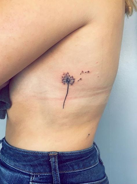 Dandelion rib tattoo Dandelion Tattoo On Ribs, Dandelion Tattoo Ribcage, Dandelion Tattoo Ribs, Dandelion Back Tattoo, Small Dandelion Tattoo, Commemorative Tattoo, Tattoo Dandelion, Dandelion Tattoos, Dandelion Tattoo Meaning