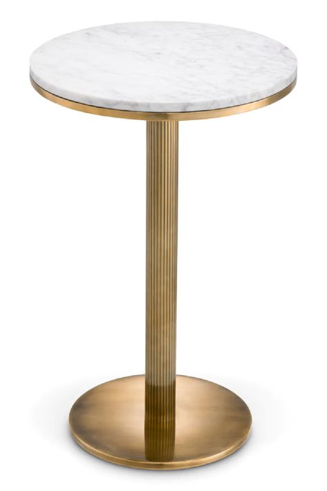 Elevate your interior with Eichholtz's Tavolara Side Table, where artisan craftsmanship meets timeless elegance. The luxurious white marble round top, enhanced with an iconic vintage brass finish, radiates sophistication perfect for any space. Dia16 x H24 in | Weight 37lbs Dia40 x H62 cm | Weight 17kgs Tabletop | Marble Base | Stainless steel, Brass, Iron Download Specification Sheet Turkish Restaurant, Marble Pedestal, Pedestal Side Table, Brass Side Table, Iron Sheet, Fast Casual, Miami Design, Round Top, European Designs