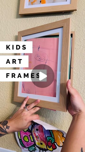 Janaiah McClure on Instagram: "With school back in session my kids have brought back more artwork than my fridge can handle! We’ve had these artwork frames for a couple years and we LOVE them. Each frame holds 50 pieces of art, a great option for storage and display before going into the memory box 💕 the kids love seeing their pieces front and center to show off to friends and family. Comment ‘FRAMES’ and I’ll send you a DM with my affiliate link!

#momideas #momlife #kidsart #kidscrafts #preschool #crafting #artframes #toddlerart #momtips #momdecor #artsandcrafts #kidsactivities #momof3" Diy Kids Art Frame, Kids Art Framed, Kids Framed Artwork, Framing Kids Artwork Wall, New Mom Advice, Frame Kids Artwork, Displaying Childrens Artwork, Frame Kids Art, Displaying Kids Artwork