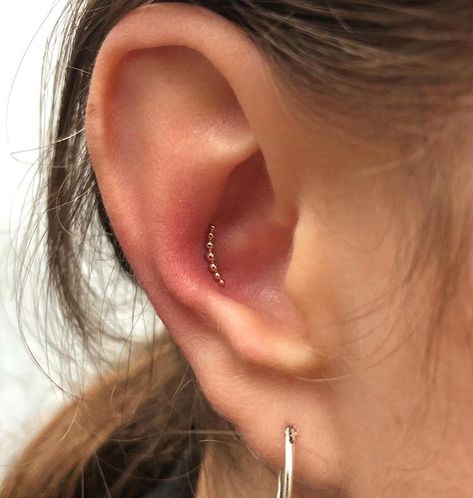 Old London Road Piercing on Instagram: “Now for something a little different! 💛 Super cute beaded piece from @aurisjewellery for this clients fresh conch pierced by Sheré -…” Curated Earrings, Conch Piercing Stud, Inner Conch Piercing, Ear Piercings Conch, Conch Stud, Conch Piercing Jewelry, Conch Jewelry, Cool Ear Piercings, London Road