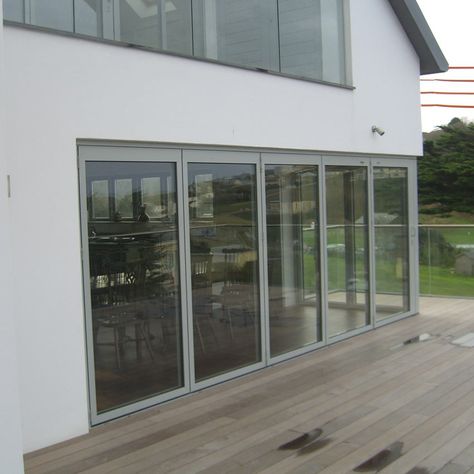 Sliding Doors External, Aluminium Bifold Doors, External Sliding Doors, Front Door Inspiration, Style Bungalow, Grey Windows, Aluminium Sliding Doors, Bungalow Renovation, Door Inspiration