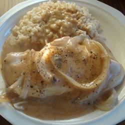 A quick mushroom gravy, courtesy of soup and a packet of peppercorn gravy mix, smothers chicken and onions. Rice is a must-have side dish. Smothers Chicken, Chicken Mushroom Sauce, Peppercorn Gravy, Peppercorn Chicken, Mushroom Sauce For Chicken, Creamy Chicken Mushroom, Easy Creamy Chicken, Sauce Au Poivre, Mushroom Sauce Recipe