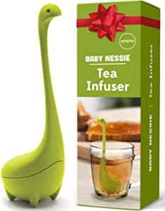 Amazon.com: OTOTO Baby Nessie Loose Leaf Tea Infuser (Green) - Dinosaur Tea Infuser Strainer with Steeping Spoon - Long Handle Neck, Cute Ball Body Lake Monster Silicone Tea Infuser for Loose Leaf Herbal Tea: Home & Kitchen Funny Kitchen Gadgets, Par Tea, Tea Steeper, Tea Diffuser, Tea Infusers, Tea Strainers, Brew Tea, Spoon Gifts, Tea Gift Sets