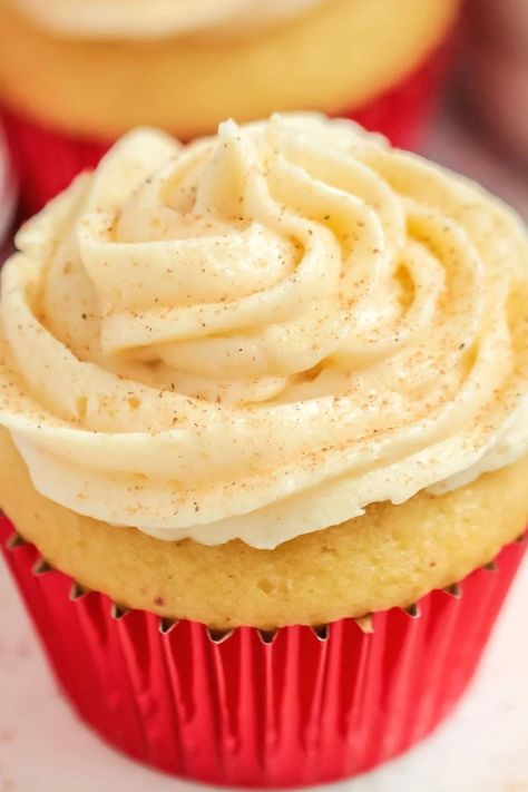 Eggnog Cupcakes! These soft homemade cupcakes are topped with whipped buttercream frosting and both are infused with creamy, festive eggnog flavor. Perfect for Christmas! | HomemadeHooplah.com Whipped Buttercream Frosting, Eggnog Cupcakes, Pumpkin Cupcake Recipes, Eggnog Cake, Whipped Buttercream, Spiced Buttercream, Homemade Eggnog, Homemade Cupcakes, Eggnog Recipe