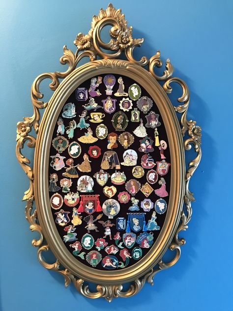 Disney Lithographs Display, Disney Pin Ideas Display, Disney Figurines Display, Disney Display Ideas Shelves, Disney Pin Collection Display, Loungefly Display Ideas Wall, Disney Display Ideas, How To Display Pins, Disney Movie Room