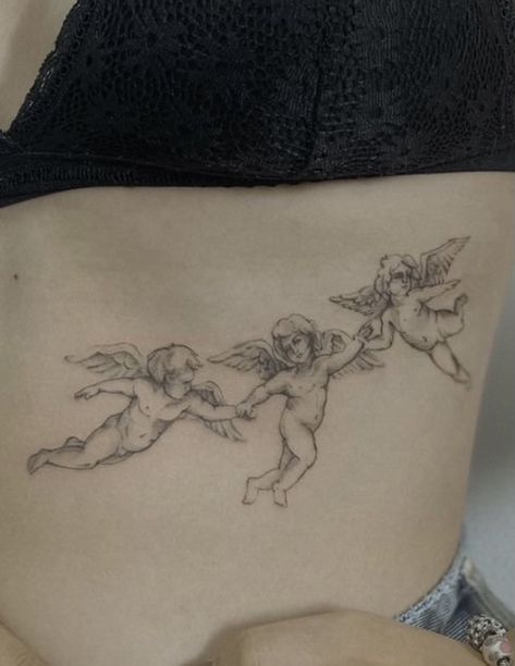 Single Needle Angel Tattoo, Three Angels Tattoo Design, 3 Angels Tattoo Designs, Aesthetic Angel Tattoo, Baby Angles Tattoos, 3 Cherub Angel Tattoo, Angelic Tattoos For Women, 3 Angels Tattoo, Biblical Angel Tattoo