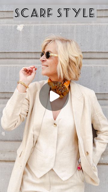 Sophie Van de Vyver on Instagram: "A touch of orange 🍊!

STYLING TIP : how to wear/tie a small square scarf like a flower choker #scarftutorial 

I never leave the house without a scarf and you ? 

FYI 
Outfit @expressofashion 
Scarf @muchogusto.nl 
Celine sunglasses 

#scarflover #suitlover #waiscoat #squarescarf #silkscarf #neverwithoutascarf #touchoforange #finishingtouch #stylishatanyage #styleismything #scarfstyle #howtotieascarf #flowerchoker #howtowearit #stylingtipsandtricks" How To Tie Small Scarf, Small Square Scarf Tying, Small Scarf Styles, French Scarf Style, How To Tie A Scarf, Scarf Tricks, Small Scarf Tying, Scarf Hacks, Square Scarf Tying