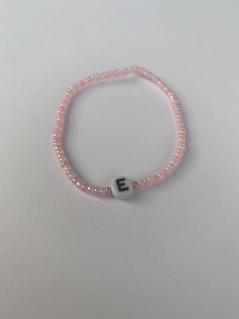 Pink & Pearl Initial Bracelet Perfect for a gift or even yourself! Why not get matching with all your friends? ---------------------------------------------- Handmade with love Pink And Pearl Bracelet, Initial Bracelet Beads, Pink Beads Bracelets, Pink Beaded Bracelets, Bracelet Initial, Bracelets Design, Simple Bracelets, Bracelet Ideas, Initial Bracelet