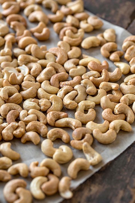 Roasted cashews are the star ingredient in this rich and creamy cashew butter. It's perfect on toast, blended into smoothies, or even by the spoonful!  | thecozyapron.com #cashewbutter #cashewbutterrecipe #cashewbutteruses #cashews Cashew Photography, How To Roast Cashews, Nuts Aesthetic, Nut Photography, Cashew Butter Recipe, Toasted Cashews, Cashew Recipes, Burfi Recipe, Food Texture