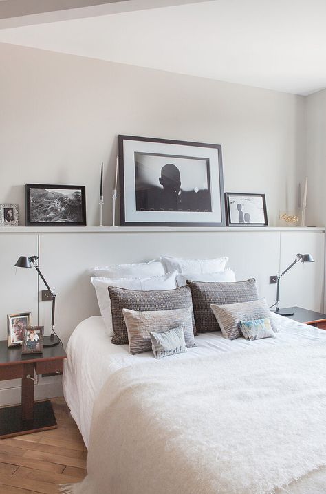 Pictures on ledge above bed in monochrome bedroom Ledge Above Bed, Picture Ledge Above Bed, Austin Apartment, Monochrome Bedroom, Gallery Wall Bedroom, Interior Design Images, Picture Ledge, Bedroom Images, Creative Lifestyle