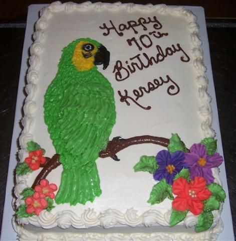 Chocolate sheet cake, vanilla butter cream.Butter cream piped parrot. Parrot Birthday Cake, Sheet Cake Vanilla, Vanilla Butter Cream Frosting, Butter Cream Cake, Wilton Decorating Tips, Butter Cream Frosting, Birthday Sheet Cakes, Chocolate Sheet Cake, 1 Year Birthday