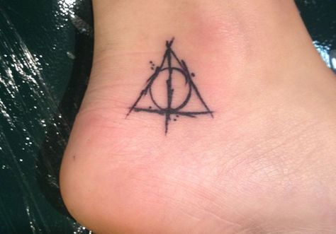 Harry Potter Deathly Hallows ankle tattoo Hallows Tattoo, Small Sister Tattoos, Tattoo Ankle, Diy Tattoo Permanent, Deathly Hallows Symbol, Small Quote Tattoos, Harry Potter Tattoos, Small Girl Tattoos, Small Tattoos For Guys