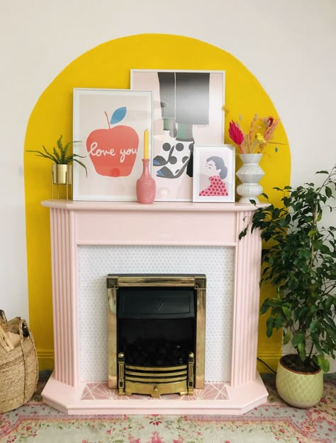 DIY fireplaces – 7 creative ideas to upgrade your fireplace | Real Homes Fireplace Decor Colorful, Bright Painted Fireplace, Mural Above Fireplace, Colour Blocking Fireplace, Painted Arch Over Fireplace, Cute Fireplace Ideas, Painted Arch Fireplace, Electric Fireplace Renter Friendly, Colorful Fireplace Decor