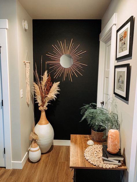 Boho Black Accent Wall, Bohemian Bedroom Accent Wall, Black Wall Esthetician Room, Boho Lobby Decor, Black Accent Wall Lash Room, Boho Living Room With Black Accents, Black Wall Home Decor, Boho Black Decor, Boho Salon Ideas Bohemian