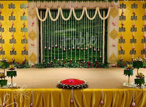 Vibrant stage decor in green and yellow hues with traditional vibes... Decor @fablecreativestudio Follow www.decorsutrablog.com for Ideas about Indian Wedding Decor Email your original pictures to @decorsutrablog@gmail.com to get featured. #wedmegood #weddingsutra #shaadisaga #shaadimagic #weddingz #WeddingInspiration #decoration #weddinginspo #instawedding #weddingflowers #haldiceremony #weddingreception #traditionalwedding #engagementdecor #weddingdetails #indianweddings #shaadi #dreamwedd Indian Baby Shower Decorations, Leaf Decor Wedding, Indian Wedding Stage, Small Wedding Decor, Engagement Stage Decoration, Simple Stage Decorations, Indian Wedding Decor, Leaves Decor, Decor For Wedding