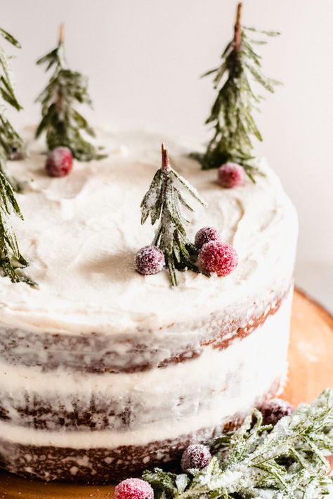 Gingerbread Cake with Mascarpone Cream Cheese Frosting - Prepare to wow your guests with this show-stopping holiday dessert! Made with the creamiest frosting, smoothed out between three layers of deeply-flavored gingerbread cake! Add some simple sugared cranberries + fresh rosemary for trees to complete this winter wonderland cake. #gingerbread #cake #gingerbreadcake #holidaydessert #christmasdessert #sugaredcranberries #rosemarytrees #holidaydessert #holidaybaking | bluebowlrecipes.com Rosemary On Cake, Naked Christmas Cake, Cake With Mascarpone Cream, Rosemary Tree, Winter Torte, Cake With Mascarpone, Winter Wonderland Cake, Wonderland Cake, Cranberry Cream Cheese