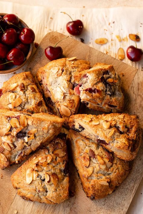 This easy Cherry Scone recipe is the best way to take advantage of stone fruit season! These tender, buttery breakfast pastries are easy to make, and perfect for a quick breakfast, brunch spread, or afternoon tea. Sweet cherries, almond extract, and a sprinkle of sliced almonds on top give them SO much flavor! Cherry Scone, Cherry Scones Recipe, White Chocolate Cherry, Cherry Scones, Brunch Spread, Almond Extract, Breakfast Pastries, Scone Recipe, Stone Fruit