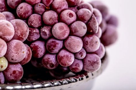 How to Freeze Grapes: 5 Ways to Use Frozen Grapes - 2023 - MasterClass Frozen Grapes Recipe, Freeze Grapes, Grape Popsicles, Healthy Snack Packs, Cotton Candy Grapes, Frozen Grapes, Grape Recipes, Fridge And Freezer, Perfect Eggs