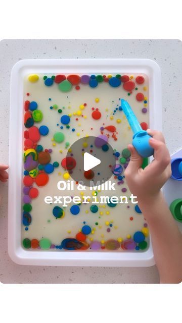 Rozanne | Bright Little Brains on Instagram: "We loved this cool and colorful Oil & Milk density Experiment! 🙌🏻

Comment “GET” for a 🔗 to a similar Test Tube and droppers stand set. 

(Our colored test tubes are from @lovevery and our animal droppers are from @curious_columbus )

MATERIALS you’ll need for this experiment: 
👉🏼 Tubes 
👉🏼 Droppers 
👉🏼 A tray 
👉🏼 Milk 
👉🏼 Oil 
👉🏼 Food coloring 

HOW TO: 
👉🏼 Pour a small amount of milk in a test tube 
👉🏼 Add a few drops of food coloring to the milk and mix 
👉🏼 Pour oil into a tray 
👉🏼 Use the droppers to drop the colored milk on the oil 
👉🏼 Notice the beautiful colored dots forming. 
Your little one will be mesmerized by the colored milk that doesn’t spread or mix with the oil. 

DISCUSSION: 
💫 Talk about the two liqui Attention Bucket Stage 3 Ideas, Milk And Oil Experiment, Simple Science Experiments For Kids, Density Experiment, Toddler Stem, Preschool Class, Test Tubes, Mom Tips, Kid Activities