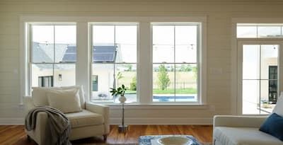 Trending: Double-Hung Windows on Pittsburgh Homes Sunroom With Double Hung Windows, Triple Window Living Room, 2 Over 2 Windows, Double Hung Windows Exterior, Cinderblock House, White Brick House Exterior, Window Design Ideas, Double Windows, Window Options