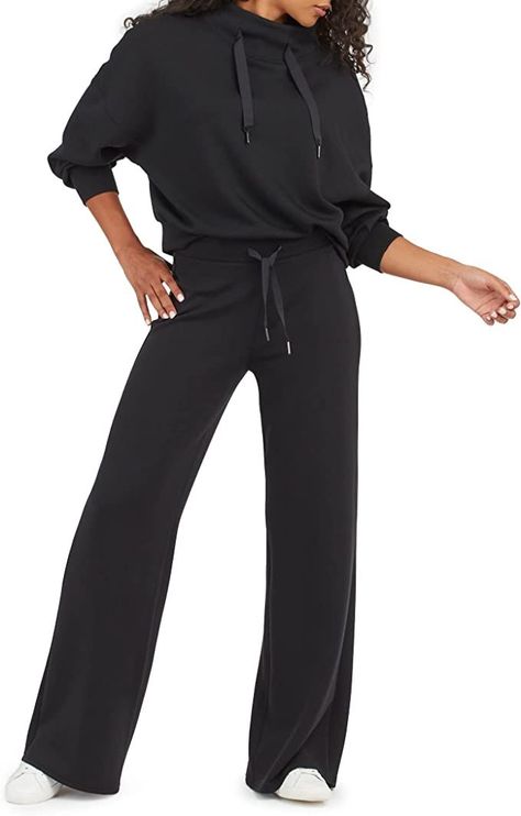 Designed with refined comfort to feel silky against your skin, the ultimate throw-on-and-go style Spanx AirEssentials Wide Leg pants will take you anywhere and everywhere. Mid-rise, relaxed fit with a leg-lengthening wide leg. Lightweight, luxuriously soft, and ultra-drapey spacer fabric. Non-shaping. Light-as-air fabric. Fine knit structure offers maximum softness. Optimal air flow and circulation for all-day comfort. These are the real deal for your next adventure! Flight Outfit, Wide Leg Leggings, Travel Outfit Plane, Outfit Inso, Knit Structure, Lightweight Pants, Athleisure Outfits, Fleece Pants, Pants Outfit