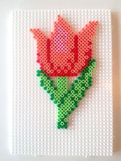 Red tulip hama perler beads Perler Pattern, Hamma Beads Ideas, Easy Perler Beads Ideas, Fuse Bead Patterns, Art Perle, Hama Beads Design, Perler Bead Designs, Perler Bead Templates, Perler Crafts