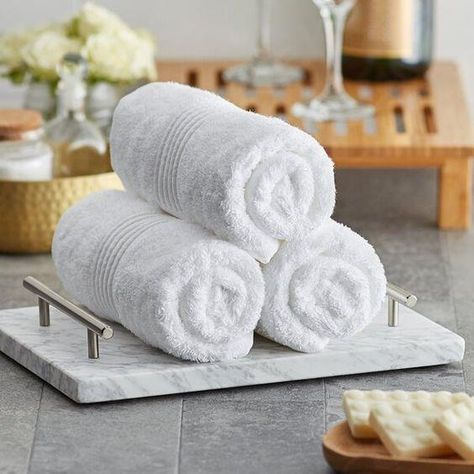 Spa Towels Display, Bath Towel Display, Towel Product Photography, Towel Tray Bathroom, Towels Photography, Dream Spa, Bathroom Decor Pictures, Hotel Toiletries, Yellow Bathroom Decor