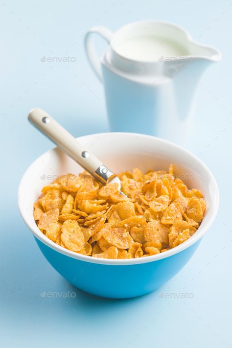 Breakfast cereals or cornflakes. by jirkaejc. Breakfast cereals or cornflakes in bowl and milk on blue background.#cornflakes, #jirkaejc, #Breakfast, #cereals Cornflakes Breakfast, Bts Ff, Healthy And Unhealthy Food, Short Tempered, Crunch Cereal, Bowl Of Cereal, Cold Hearted, Corn Flakes, Breakfast Items